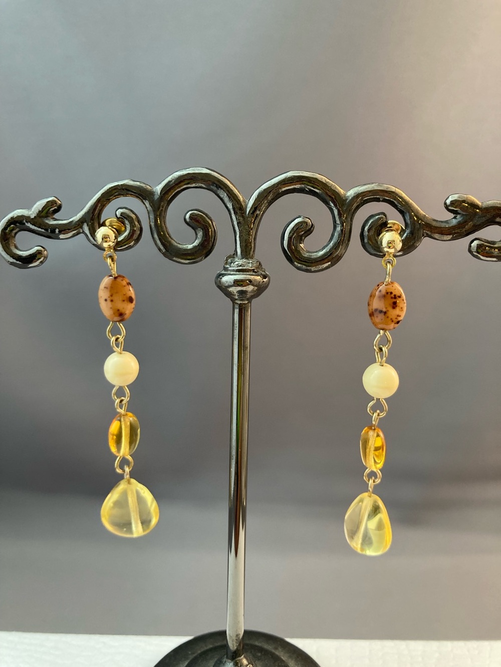 Goldtone metal pale yellow tone beads dangle earrings